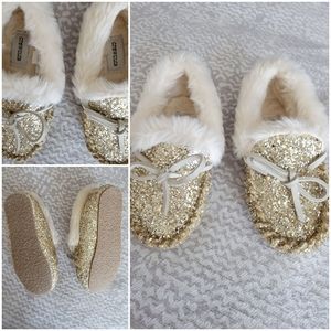 Gold fuzzy slippers